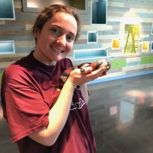 corie holding a cute snake