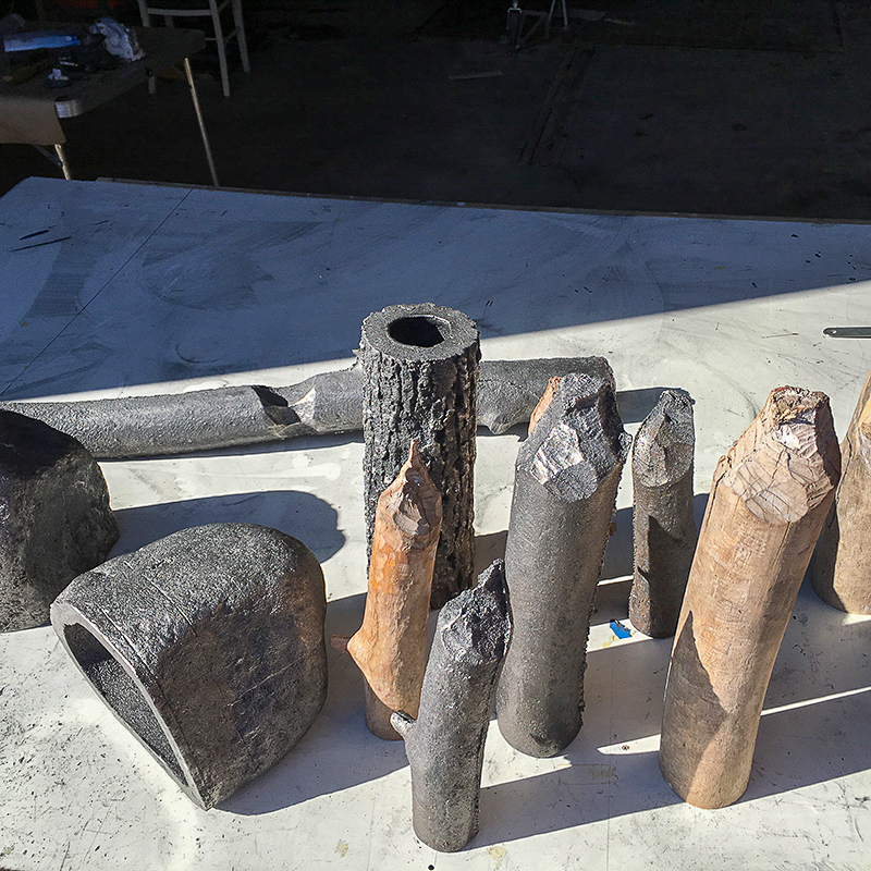 Concrete and metal cast stones