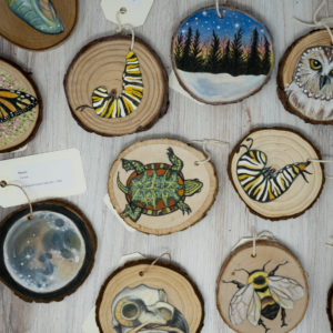 Assortment of hand painted wood ornaments 
