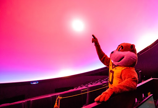 The University of Minnesota's mascot, Goldy the Gopher, in the planetarium