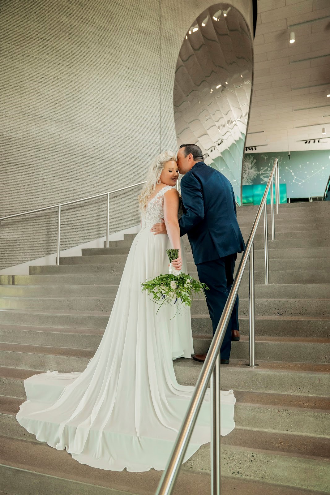 Newlyweds on the staircase
