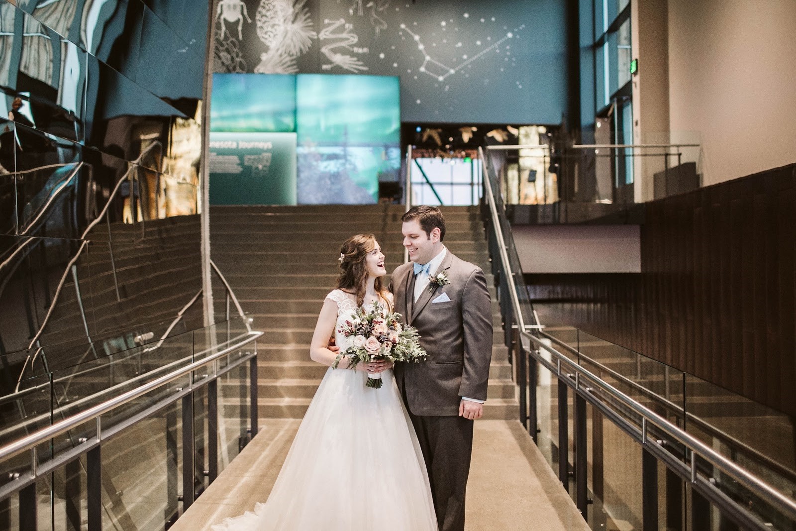 Newlyweds in front of the museum stairs